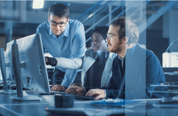 Developers working on computer inside the office