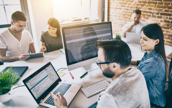 Programmer working in a software develop company office
