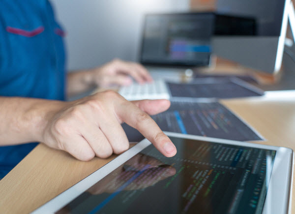 web developer coding for program working on software